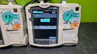 2 x Philips Heartstart MRx Defibrillators (Both Power Up with Stock Module, Stock Module Not Included) Including ECG and Printer Options with 2 x 3 Lead ECG Leads and 1 x Paddle Lead - 3