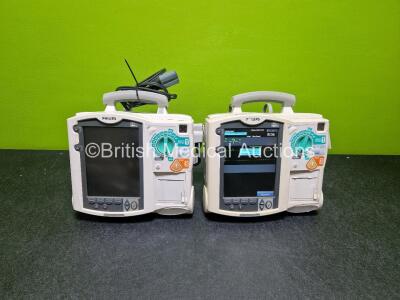 2 x Philips Heartstart MRx Defibrillators (Both Power Up with Stock Module, Stock Module Not Included) Including ECG and Printer Options with 2 x 3 Lead ECG Leads and 2 x Paddle Leads