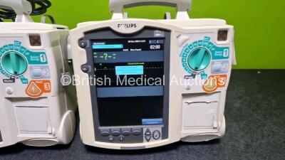 2 x Philips Heartstart MRx Defibrillators (Both Power Up with Stock Module, Stock Module Not Included) Including ECG and Printer Options with 2 x 3 Lead ECG Leads and 2 x Paddle Leads - 2