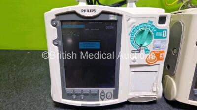 2 x Philips Heartstart MRx Defibrillators (Both Power Up with Stock Module, Stock Module Not Included) Including ECG and Printer Options with 2 x 3 Lead ECG Leads and 2 x Paddle Leads - 3