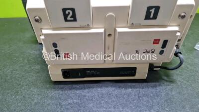 Medtronic Lifepak 12 Biphasic Defibrillator (Powers Up Damage to Casing - See Photos) In Case Including Pacer, ECG and Printer Options with AC Power Adaptor (Powers Up) and Test Load - 7