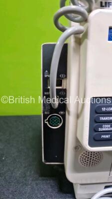 Medtronic Lifepak 12 Biphasic Defibrillator (Powers Up Damage to Casing - See Photos) In Case Including ECG, Sp02,NIBP and Printer Options with DC Power Adaptor - 3