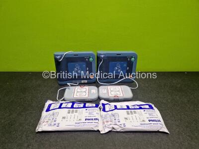 2 x Philips Heartstart FRx Defibrillators (Both Power Up) in Case with 2 x M5070A LiMnO2 Batteries *Install Before 2020 / 2024* and 4 x Smart Pads 2