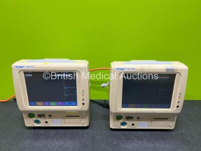 2 x Fukuda Denshi Dynascope DS-7100 Vital Signs Monitors with 1 x Power Supply (Both Power Up) Including ECG, BP, SpO2, Temp and NIBP Options *SN 50000197 / 50000379*