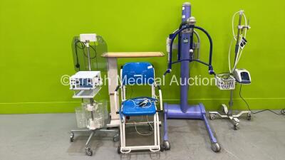 Mixed Lot Including Fisher and Paykel Airvo2 Humidifier on Stand (Powers Up with Blank Screen), 1 x Arjo Maxi Move Electric Patient Hoist with Battery and Controller (No Power), 1 x Seca Wheelchair Weighing Scales, 1 x Over the Bed Table and 1 x Hologic A