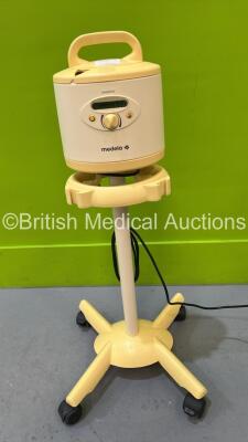 Medela symphony Pump on Stand (Powers Up - Cracked Trim - See Pictures) *S/N 1336280*