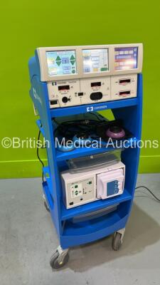 Valleylab ForceTriad Electrosurgical / Diathermy Unit Version 3.60 on Trolley *Mfd 02-2014* with Smoke Evacuator 1 x LigaSure Footswitch and 2 x Dome Footswitches (Powers Up - Some Casing Damage - See Photo) *T4B39791EX*