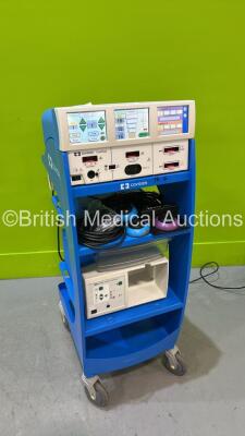 Valleylab ForceTriad Electrosurgical / Diathermy Unit Version 4.00 on Trolley *Mfd 02-2015* with Smoke Evacuator 1 x LigaSure Footswitch and 3 x Dome Footswitches (Powers Up - Some Casing Damage - See Photo) *T4B39791EX*