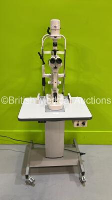 H SLM Slit Lamp MOdel SLM-2ER with Binoculars, 2 x 12,5x Eyepieces and Chin Rest on Motorized Table (Powers Up) *S/N NA*