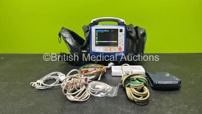 Zoll X Series Defibrillator with ECG, SPO2, NIBP and CO2 Options, 4 and 6 Lead ECG Leads, 2 x SPO2 Finger Sensors with 1 x Connector Cable, 2 x NIBP Cuffs with 1 x Hose and 2 x Batteries *1 x Flat Battery* (Powers Up and Passes Self Test, Missing Printer 