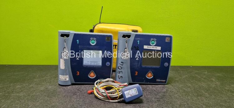 Job Lot Including 2 x Laerdal Heartstart FR2+ Defibrillators with 2 x LiMnO2 Battery *Both Flat* and 1 x 3 Lead ECG Lead in Case (Both Power Up with Stock Battery - Stock Battery Not Included)