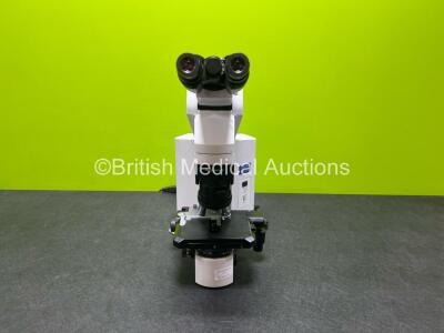 Olympus Model BX45TF Benchtop Microscope with 2 x Olympus WHN10X-H/22 Eyepieces and 3 x Optics *1 x Plan 20 x 0.40, 1 x Olympus ACH JUX / 1.25, 1 x Olympus Plan 40 x 0.65 (Powers Up) *SN 1L00529*