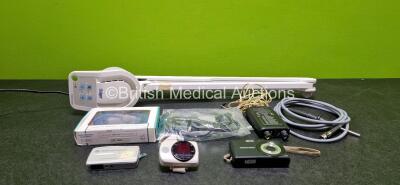 Mixed Lot Including 1 x Drager VarioLux Patient Light (Power Up), 1 x Konica Minolta Pulsox 300 Wrist Oximeter, 1 x GE SEER Light Extend Compact Digital Holter, 1 x WaltersMedical Adaptor for Philips Compatible SpO2 Sensor, 1 x Fiber Optic Light Cable, 1 