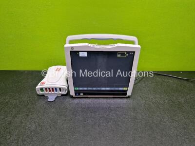 GE Type B450 Carescape Touch Screen Patient Monitor *Mfd 2020* with 1 x Li-ion Battery (Powers Up, Damage to Casing - See Photo) and GE Patient Data Module Ref 2016793-002 Including ECG, Temp/CO, P1/P3, P2/P4, SpO2 and NIBP Options *Mfd - 2020 (Powers Up)