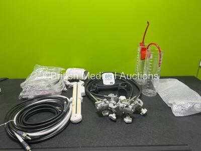 Mixed Lot Including 1 x Omron M3 Comfort Patient Monitor, 2 x Cardinal Health Medi-Vac Flex Advantage Suction Units, 2 x Unknown Pole Attachments, 3 x Paramount PM-4 Urofunnels, 3 x Various Gas Hoses, 1 x LUXO Tridonic Light Arm and Various CPU Host Cable