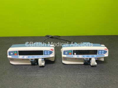 2 x Carefusion GH Alaris Syringe Pumps (1 x Powers Up, 1 x Draws Power)