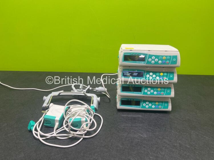 4 x B.Braun Infusomat Space Infusion Pumps (3 x Power Up, 1 x No Power) with 2 x Power Supplies and 1 x Pole Clamp *SN 200625 / 201023 / 200637 / 200942*