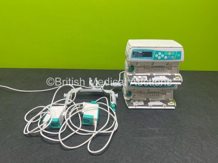 4 x B.Braun Infusomat Space Infusion Pumps (All Power Up) with 1 x Power Supply and 1 x Pole Clamp *SN 200714 / 201055 / 200787 / 200927*