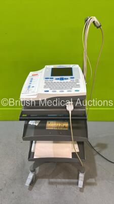 Burdick Atria 6100 ECG Machine with 1 x AC Power Supply and 1 x 10 Lead ECG Lead on Trolley (Powers Up) *SN A6100-002138*