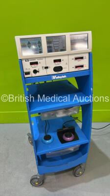 Covidien Force Triad Electrosurgical / Diathermy Unit Version 4.00 on Stand with Dome Footswitch and LigaSure Footswitch (Powers Up) *S/N T2H31137EX*