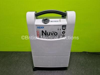 Nidek Nuvo Lite Mark 5 Oxygen Concentrator *Running Hours Less Than 5 * with Accessories *Mfd - 2020* (Powers Up - Like New in Box) *SN 20202074* (g) *cage*