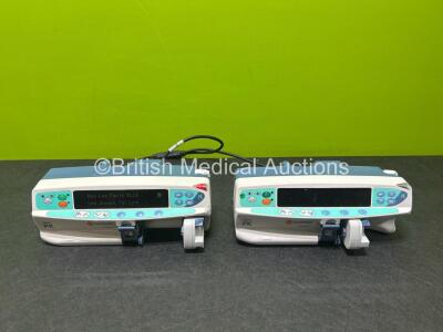 2 x Carefusion Alaris PK Syringe Pumps (1 x Powers Up, 1 x Draws Power)