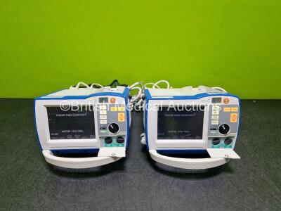 2 x Zoll R Series Plus Defibrillator / Monitors (Both Power Up) Including Pacer, ECG and Printer Options with 2 x Paddle Leads *SN (21)A555H04835 / AF13B027345*