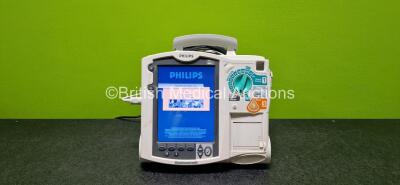 Philips Heartstart MRx Defibrillator (Powers Up) Including ECG and Printer Options with 1 x Philips M3539A Module, 1 x Philips M3538A Li-Ion Battery, 1 x 3 Lead ECG Lead and 1 x Paddle Lead *SN US00583355*