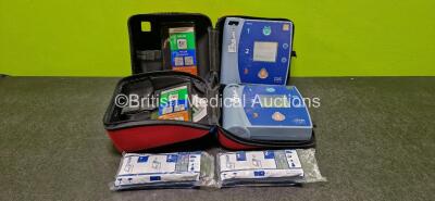 2 x Philips HeartStart FR2+ Defibrillators with 4 x LiMnO2 Batteries *Install Before 1 x 2022, 1 x 2026, 1 x 2028 & 1 x 2029* in Carry Cases (Both Power Up and 1 x Faulty Screen - See Photo)