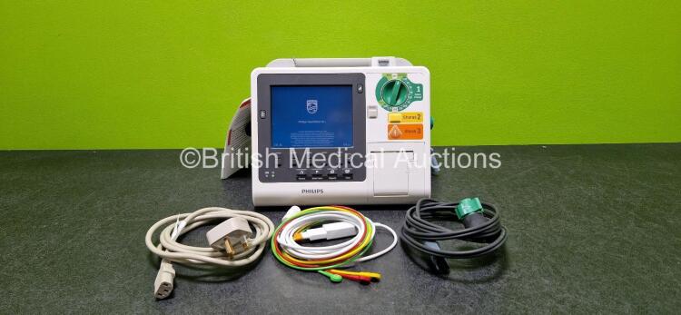 Philips Heartstart XL+ Defibrillator (Powers Up) Including ECG and Printer Options with Paddle Lead, 3 Lead ECG Lead and Li-Ion Battery