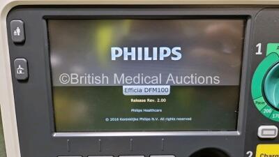 Philips Efficia DFM100 Defibrillator Release Rev 2.00 *Mfd 2020* (Powers Up) Including Pacer, ECG and Printer Options with 1 x Lithium Battery, 1 x Paddle Lead, 1 x 3 Lead ECG Lead and 1 x Power Cord - 3