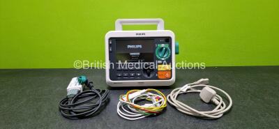 Philips Efficia DFM100 Defibrillator Release Rev 2.00 *Mfd 2019* (Powers Up) Including Pacer, ECG, NIBP, SpO2, CO2 and Printer Options with 1 x Lithium Battery, 1 x Paddle Lead with 1 x Test Load, 1 x 3 Lead ECG Lead and 1 x Power Cord