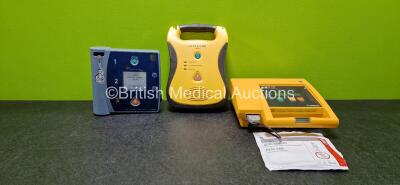 Job Lot Including 1 x defibtech LifeLine AED Defibrillator (Untested Due to No Battery), 1 x Agilent Heartstream FR2 Defibrillator (Powers Up with Stock Battery - Stock Battery Not Included) and 1 x Medtronic Physio-Control Lifepak 500 Biphasic Automated 