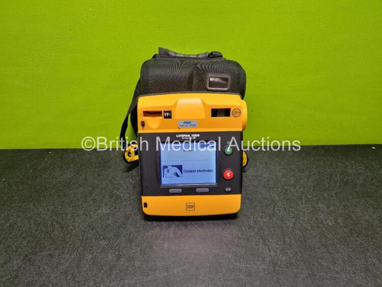 Medtronic Lifepak 1000 Defibrillator *Mfd - 2013* (Powers up with Stock Battery Stock Battery Not Included)