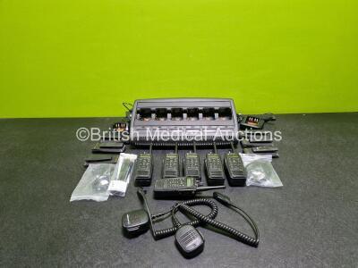 Job Lot Including 6 x Motorola DP3600 Digital Radios (All Power Up, 1 x Faulty Screen - See Photo) with Charging Station (Powers Up) 6 x Spare Li-Ion Batteries, 2 x Speakers, 2 x Earpieces and 2 x Portable Chargers