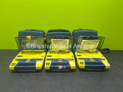 3 x Cardiac Science Powerheart AED G3 Automated External Defibrillators with 2 x LiSO2 Batteries in 3 x Carry Cases (Both Power Up)