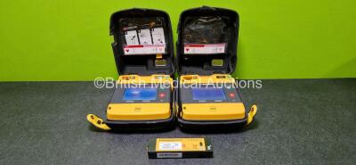 2 x Physio Control Lifepak 1000 Defibrillators (Both Power Up with Stock Battery - Stock Battery Not Included) with 1 x Li/MnO2 Battery *Flat* in Carry Cases *SN 42196542 / 42196630*