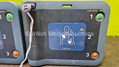 2 x Philips Heartstart FRx Defibrillators (Both Power Up) with 2 x M5070A LiMnO2 Batteries *Install Before 2028* and 2 x Smart Pads II *Both Expired* - 4