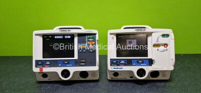 Job Lot Including 1 x Medtronic Lifepak 20 Defibrillator / Monitor (Powers Up and Damaged Casing - See Photo) Including Pacer, ECG and Printer Options and 1 x Physio Control Lifepak 20e Defibrillator / Monitor (Powers Up) Including ECG and Printer Options