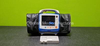 Zoll X Series Monitor/Defibrillator Application Version 02.34.05.00 Including Pacer, ECG, SPO2, NIBP, CO2 and Printer Options with 2 x Sure Power II Li-Ion Batteries *1 x Flat* (Powers Up and Passes Self Test - See Photo) *SN AR16D018716*