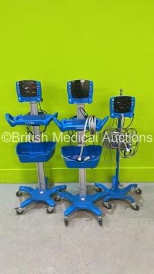 3 x GE Dinamap V100 Patient Monitors on Trolleys with Power Supplies (All Power Up)