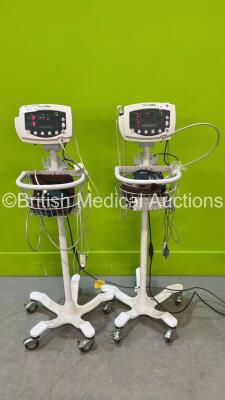 1 x Welch Allyn 53NT0 and 1 x Welch Allyn 53N00 Patient Monitors on Stands with Power Supplies (Both Power Up)