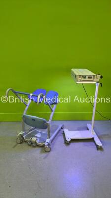 1 x Drager Phototherapy 4000 Lamp (Powers Up) and 1 x Arjo Stedy Patient Standing Aid