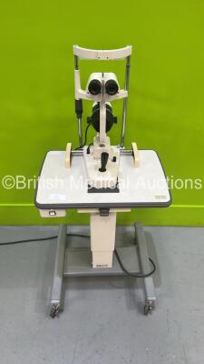 TopCon SL-4F Slit Lamp with Binoculars, 2 x 12,5x Eyepieces and Chin Rest on Hydraulic Table (Powers Up) *S/N 420105* - 2