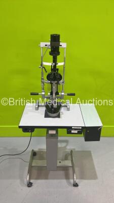 Haag Streit Bern SL900 Slit Lamp with Binoculars, 2 x 10x Eyepieces, 2 x 16x Eyepieces and Chin Rest on Hydraulic Table (Powers Up with Good Bulb - 3 x Table Wheels Damaged) *S/N U900040428* - 2