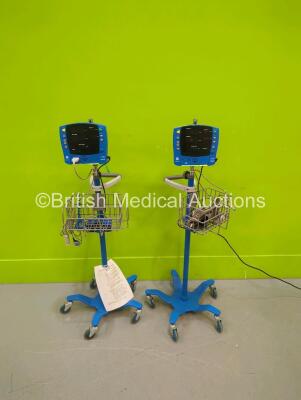 2 x GE Carescape V100 Vital Signs Monitors on Stands (Powers Up)