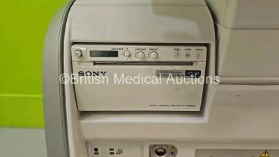 GE Vivid E9 XDClear Flat Screen Ultrasound Scanner **Mfd 2015** Application Software Version 113 Revision 1.7 System Software Version 104.3.6 (Powers Up, Keyboard Does Not Lock Into Place) and 1 x Sony DR85MD Printer (Powers Up) *SN VE99305* **IR291** - 12