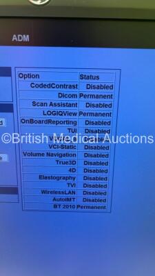 GE Vivid E9 Flat Screen Ultrasound Scanner Model 5205000-4 *S/N 98820US4* **Mfd 2010** Software Version R2.0.4 (Powers Up - Lower Screen Damaged / Missing Rear Lug - See Pictures - Clicking Noise When Turned On ) ***IR223*** - 16