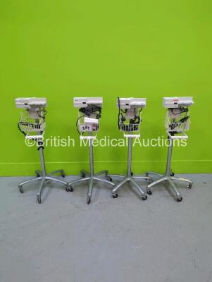 4 x Welch Allyn 767 Transformer with 8 x Attachments on Stands