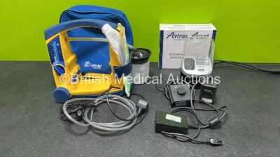 Mixed Lot Including 1 x Airtraq Avant Docking Station (Powers Up) in Box, 1 x Laerdal Suction Unit with Cup , AC and DC Power Supplies (Spares / Repairs) and 1 x Keeler Power Supply (No Power)